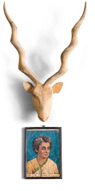 carved antelope head on wall